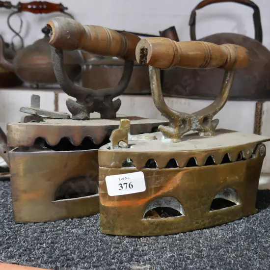 2 brass irons
