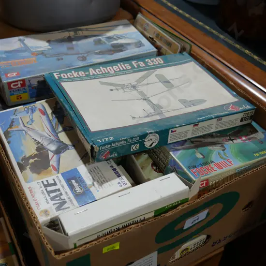 Box of plastic plane kits