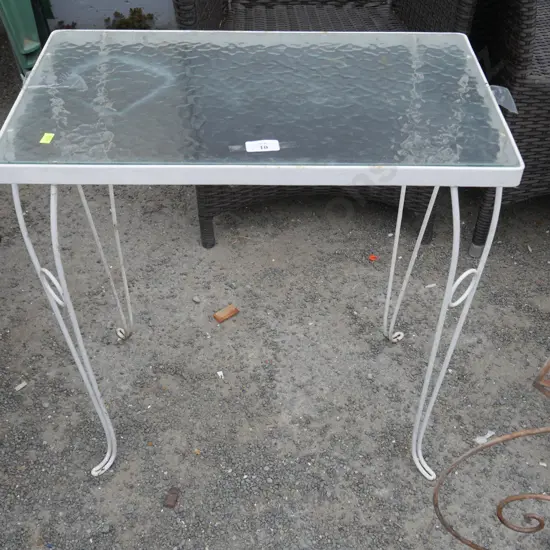 Glass top wrought iron table