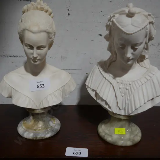 2 bust figures