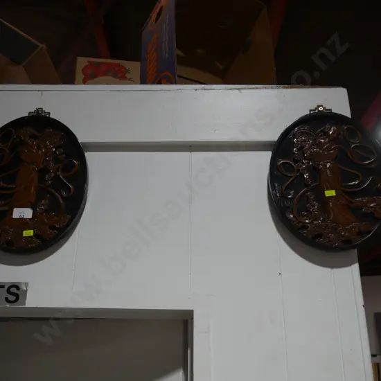 Pair of wooden carved oriental lady wall plaques