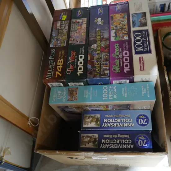 Box of jigsaw puzzles
