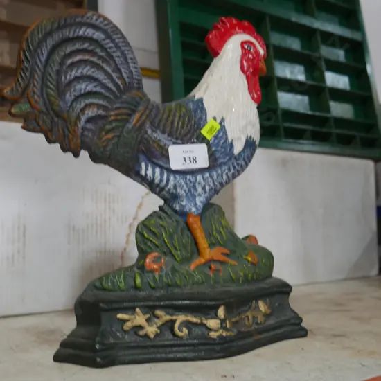 Cast rooster door stop