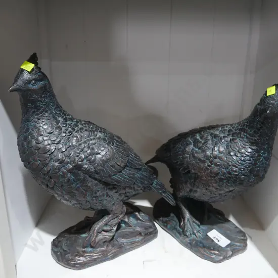 Pair of pheasant figurines