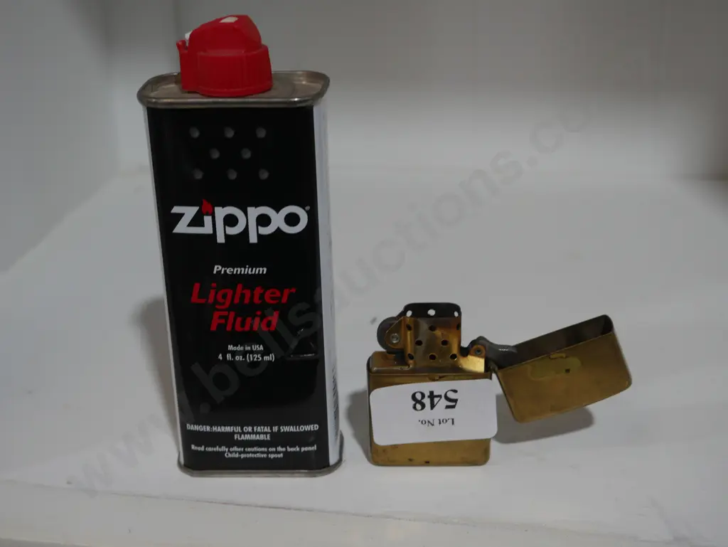 Zippo lighter and lighter fluid Image 1++