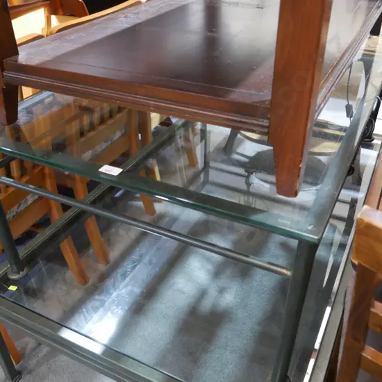 Metal base glass top coffee table