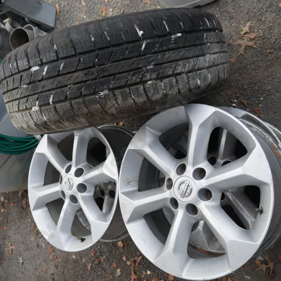 4 nissan rims and wheel