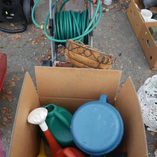 Watering cans, planters, and retractable hose