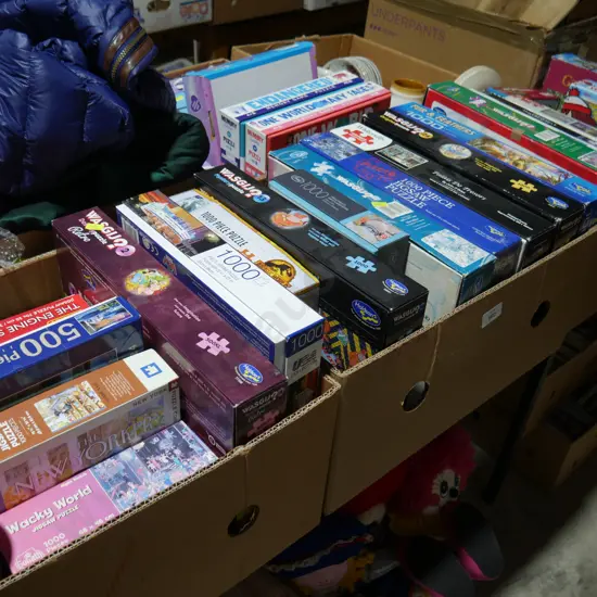 3 boxes of jigsaw puzzles
