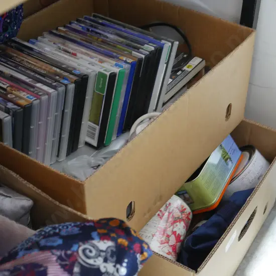 2 boxes of Dvds, tins etc