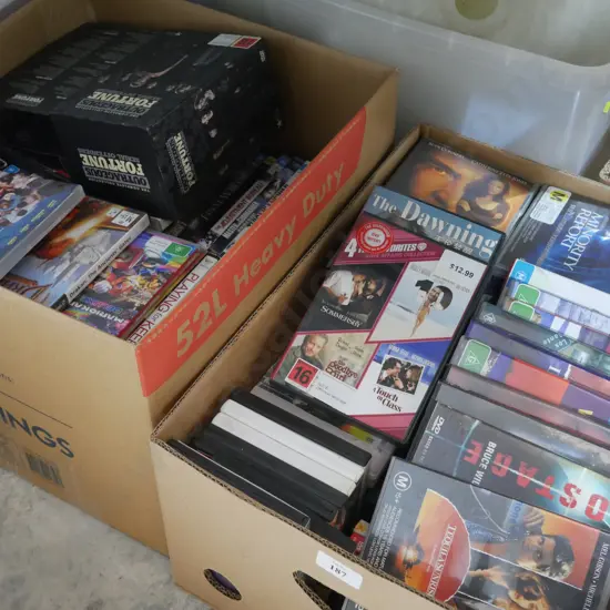 2 boxes of dvds