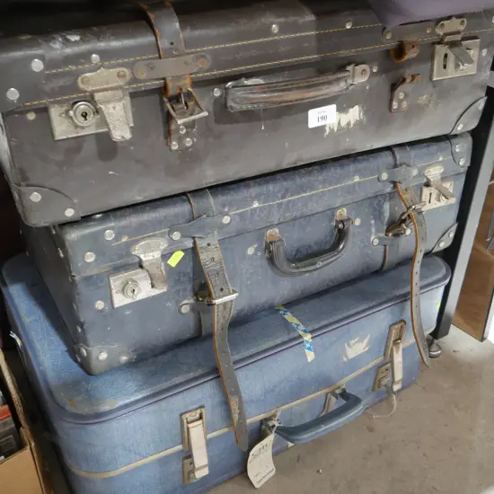 3 vintage suitcases