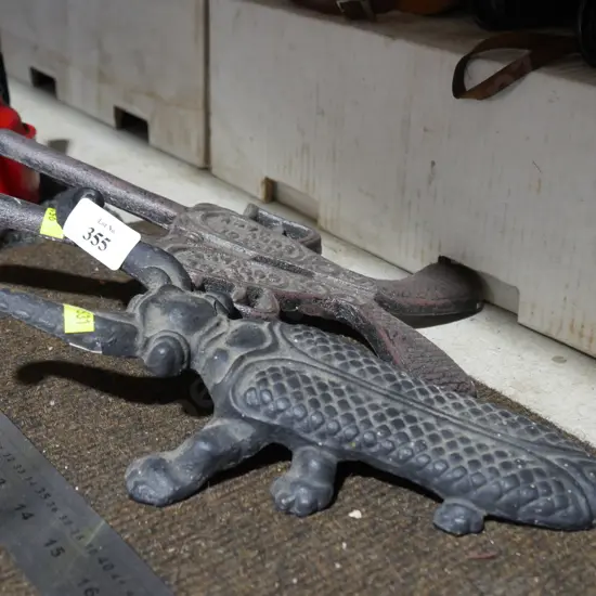 Cast iron beetle and pistols boot jacks