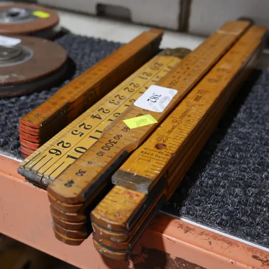 Folding wooden rulers