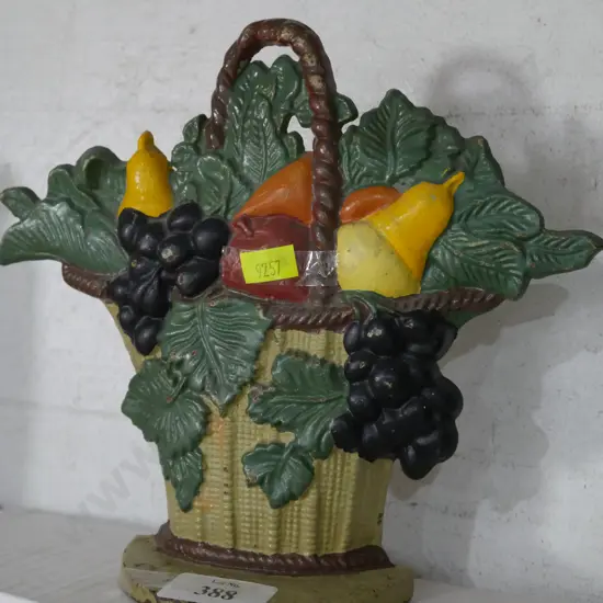 Cast fruit basket door stop