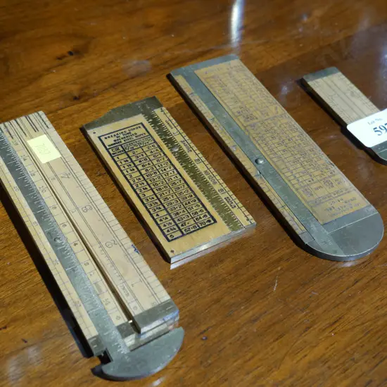 4 vintage rulers etc