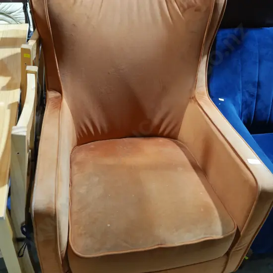 Orange velvet arm chair