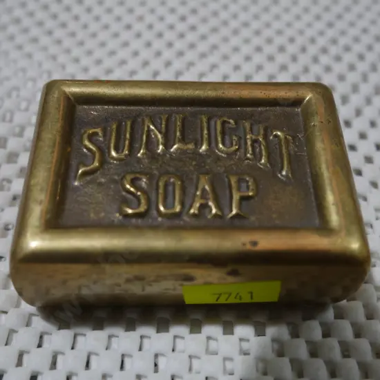 Brass sunlight soap paper weight