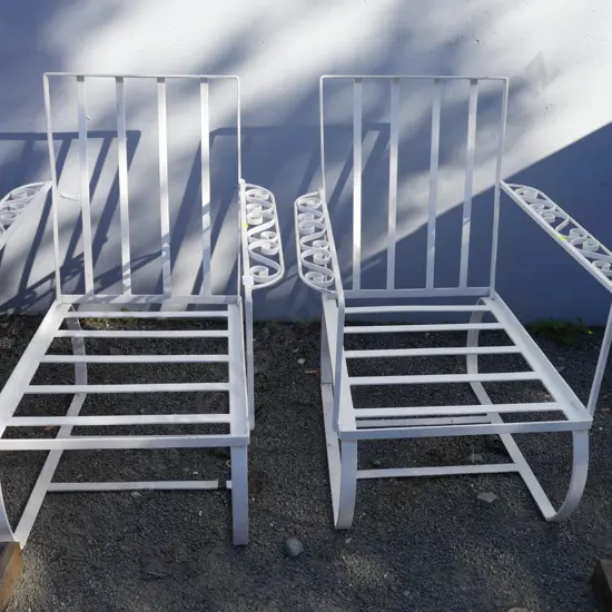 2 wrought iron chairs