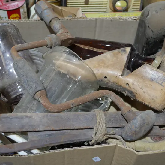 Old hand drill, glass bottles etc