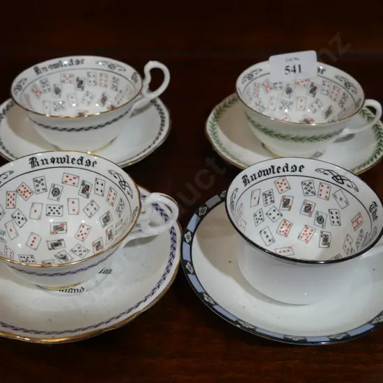 4 Dunedin Exhibition cup of knowledge cups and saucers