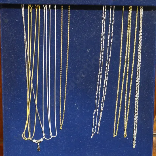 Necklaces on display board