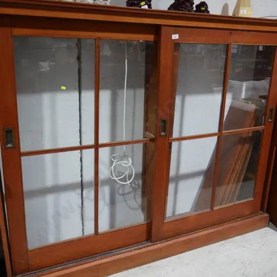 Glazed sliding door bookcase