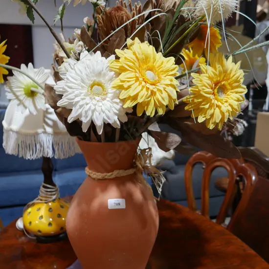 Artificial plants in vase