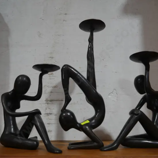 Figurine candle holders