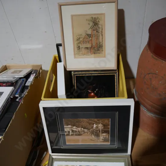 Container of assorted artworks