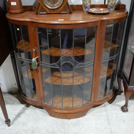 Bow front leadlight cabinet