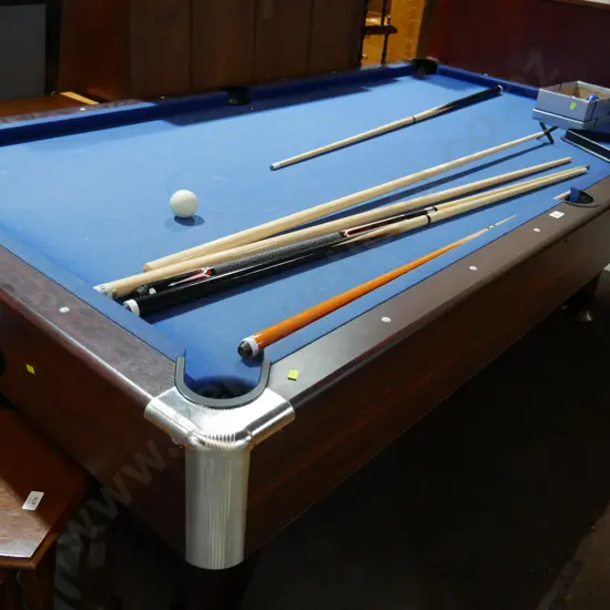 Pool table. Ques and balls