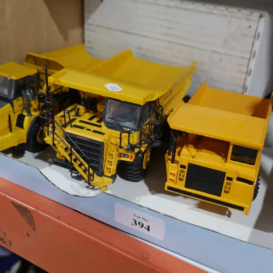 3 dump trucks