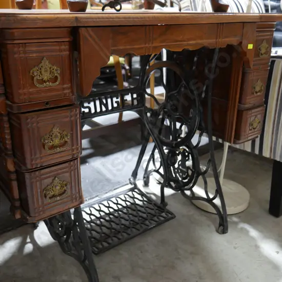 Singer sewing machine base