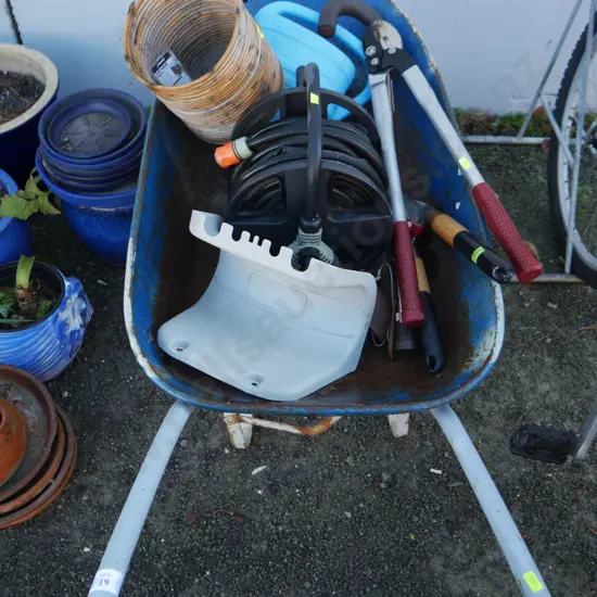 Wheelbarrow and garden tools